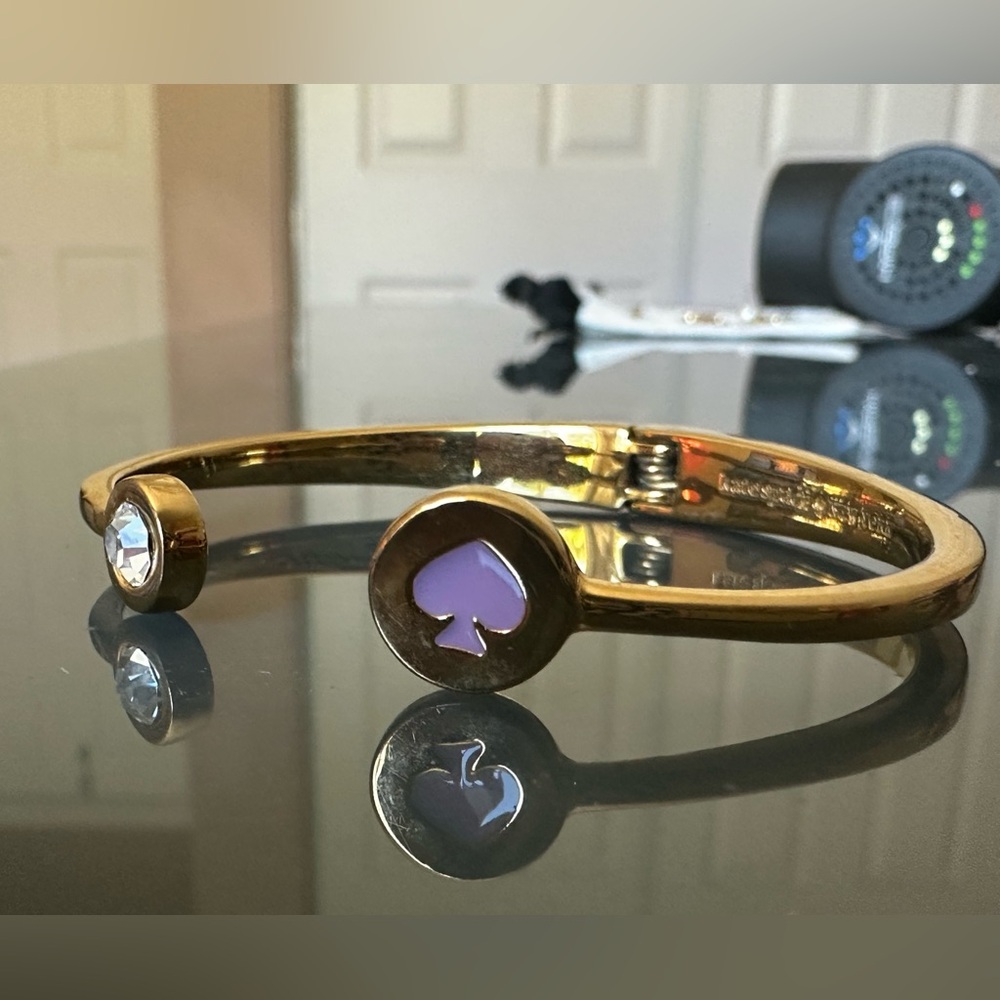 Kate Spade Gold Bracelet with Purple Spade Accent